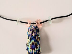 Ketting met hangertje van stof